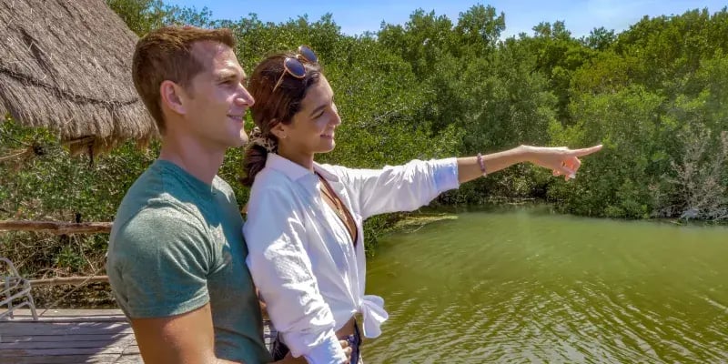 Couple in the lagoon of isla contoy